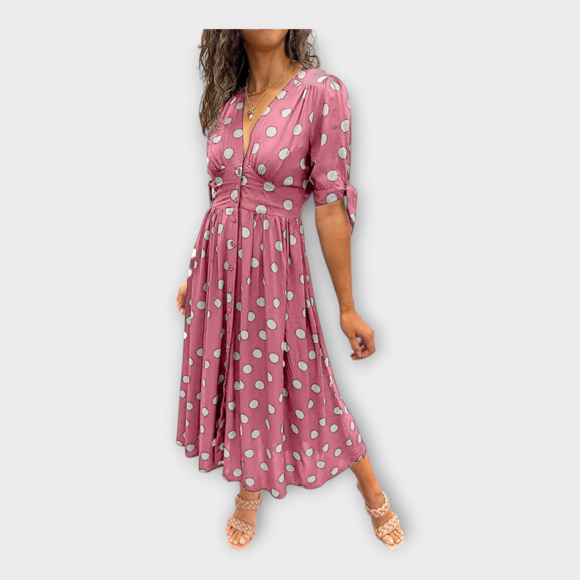 Elegantna obleka z modernim vzorcem in brezčasno eleganco