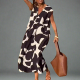 Obleka V z vzorcem iz blaga