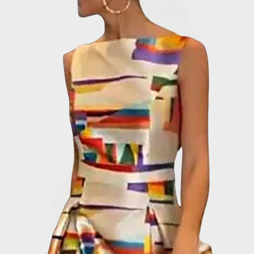 Dolga obleka z geometrijskimi vzorci in modernim krojem