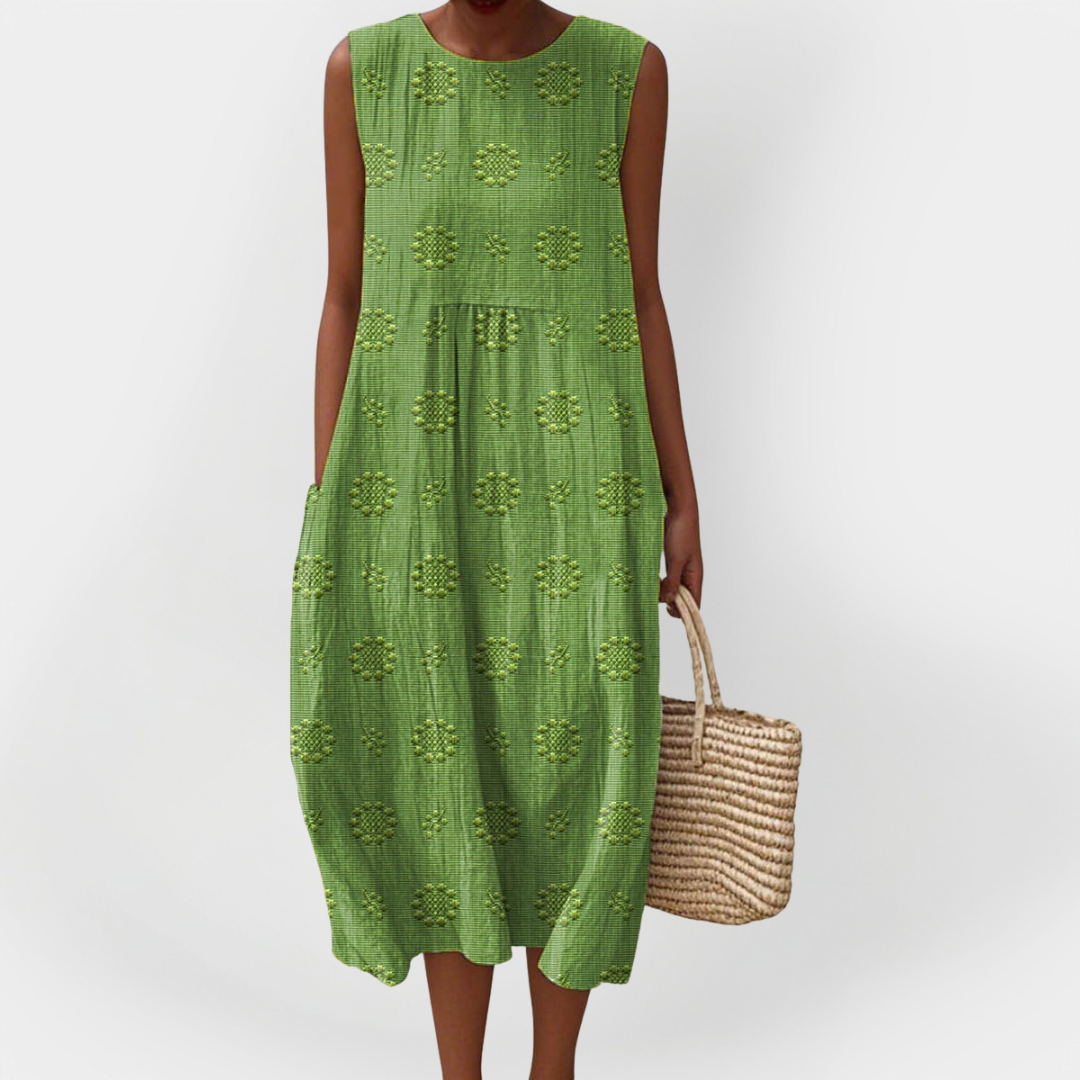 Elegantna brezrokavnik obleka iz bombaža z žepi