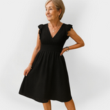 Impresivna obleka z napihnjenim pasom