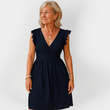 Impresivna obleka z napihnjenim pasom