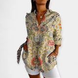 Bluza s Gumbi in Cvečno Zasnovo