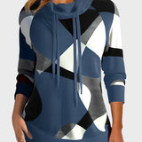 Pleteni pulover z umetniškim vzorcem in kapuco