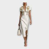 Obleka z rafiniranim vezenim detajlom