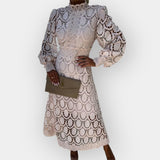 Romantična obleka z detajli čipke