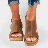 Sandal z dvignjenim podplatom iz usnja