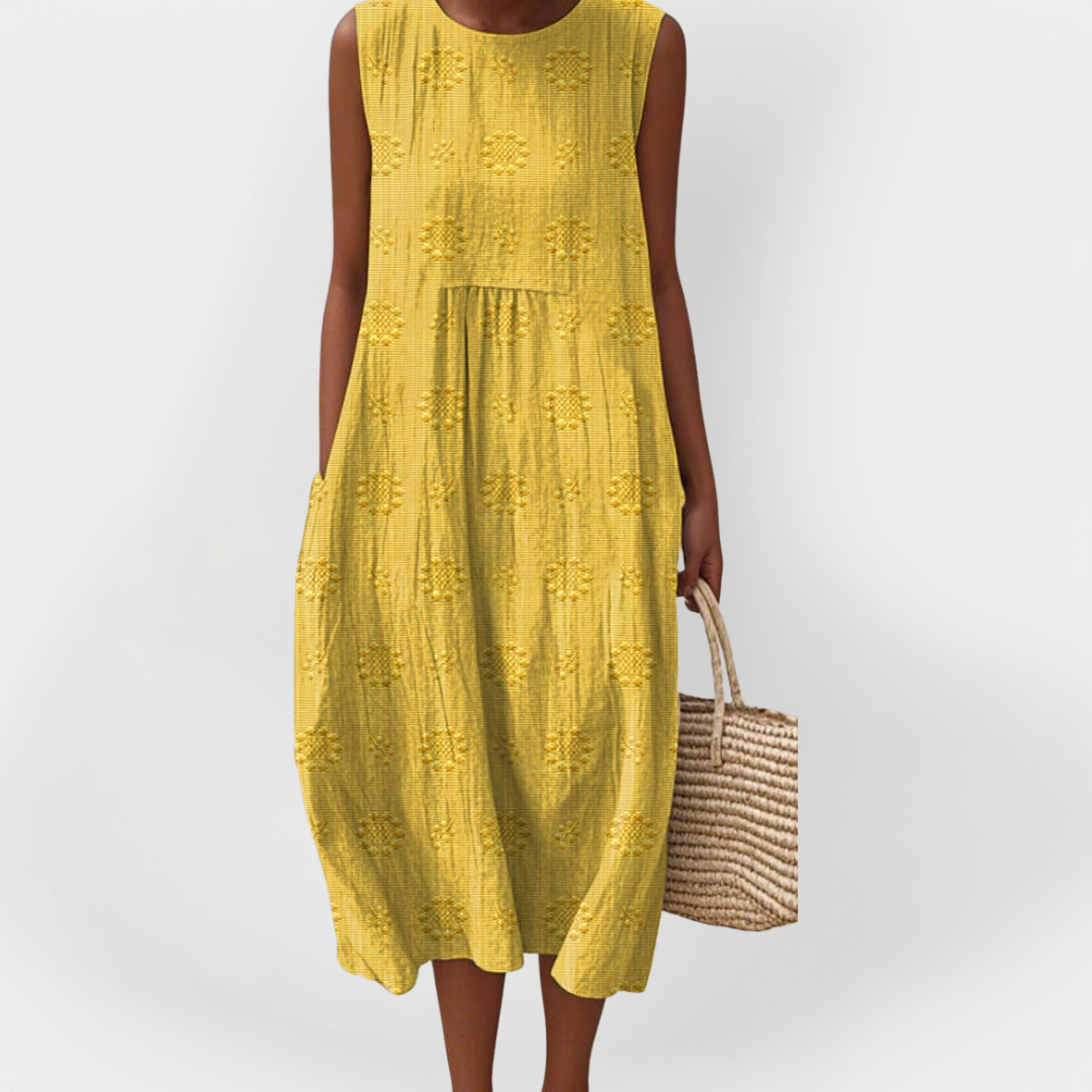 Elegantna brezrokavnik obleka iz bombaža z žepi