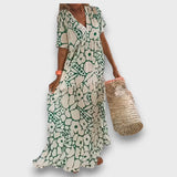 Dolga obleka z cvetličnim vzorcem in gumbi