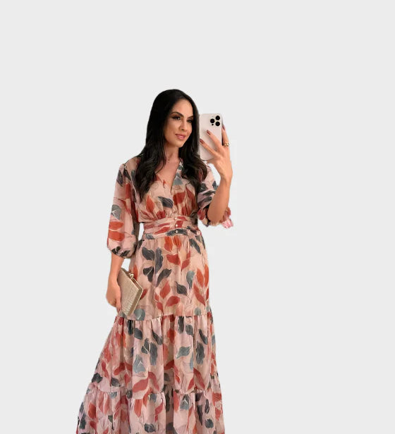 Dolga obleka z cvetličnim vzorcem in udobno silhueto za elegantne dni