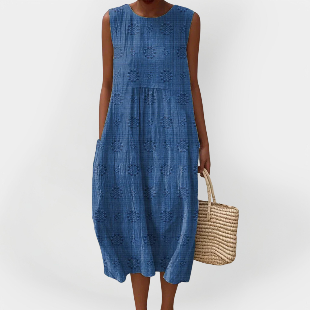 Elegantna brezrokavnik obleka iz bombaža z žepi