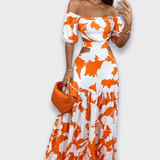 Silhuetno obleko iz luksuznega materiala