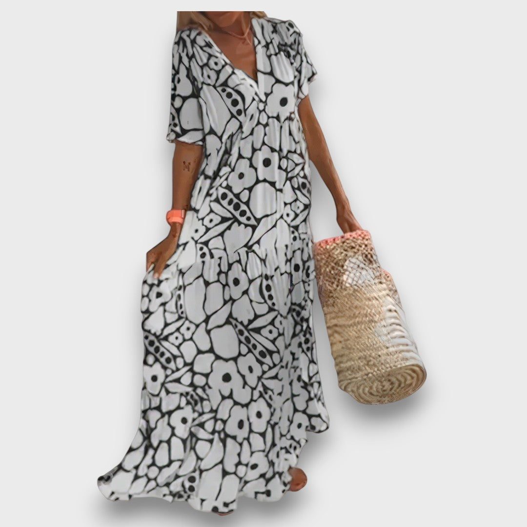 Dolga obleka z cvetličnim vzorcem in gumbi