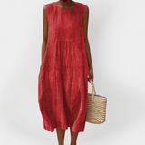 Elegantna brezrokavnik obleka iz bombaža z žepi