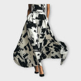 Dolga obleka z umetniško eleganco