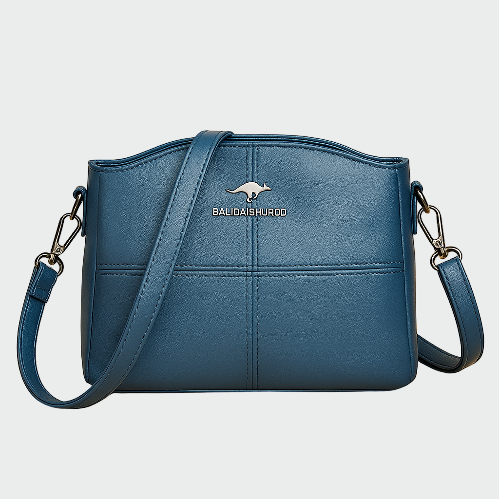 Eleganten usnjen nahrbtnik