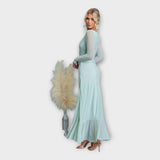 Impresivna obleka s prefinjeno silhueto