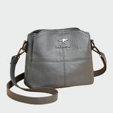 Eleganten usnjen nahrbtnik