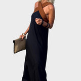 Elegantna obleka z odprtim hrbtom in modernim prečnim ovratnikom