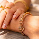 Zlata zapestnica z denarno zasnovo