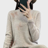 Pleteni pulover z vzorcem metulja