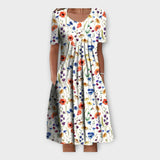 Obleka z Cvetličnim Motivo in Kratkimi Rokavi