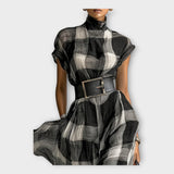 Obleka z rafiniranim tokom in eleganco