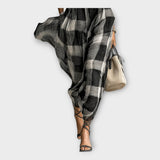 Obleka z rafiniranim tokom in eleganco