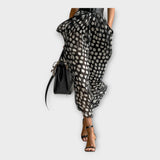 Dolga obleka z rafinirano in brezčasno estetiko