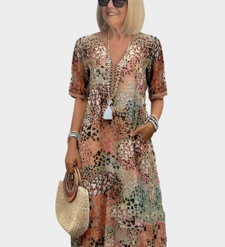 Zračna obleka z poletnim vzorcem in V-izrezom