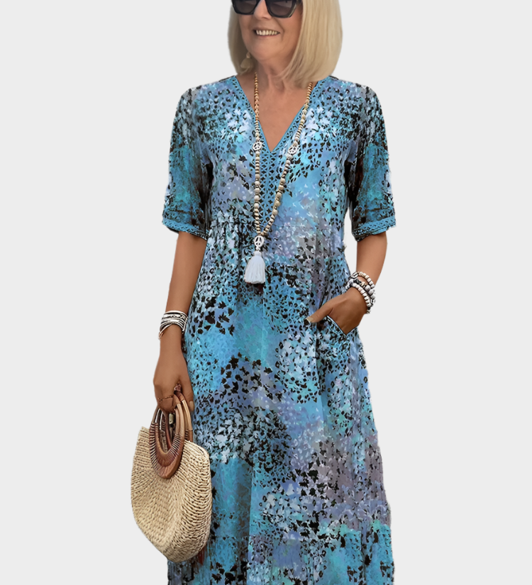 Zračna obleka z poletnim vzorcem in V-izrezom