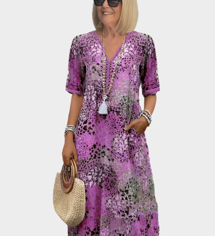 Zračna obleka z poletnim vzorcem in V-izrezom