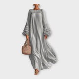 Zračno dolgo obleko z elegantnimi detajli