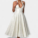 Midi obleka z odprtim hrbtom in stiliziranim korzetom