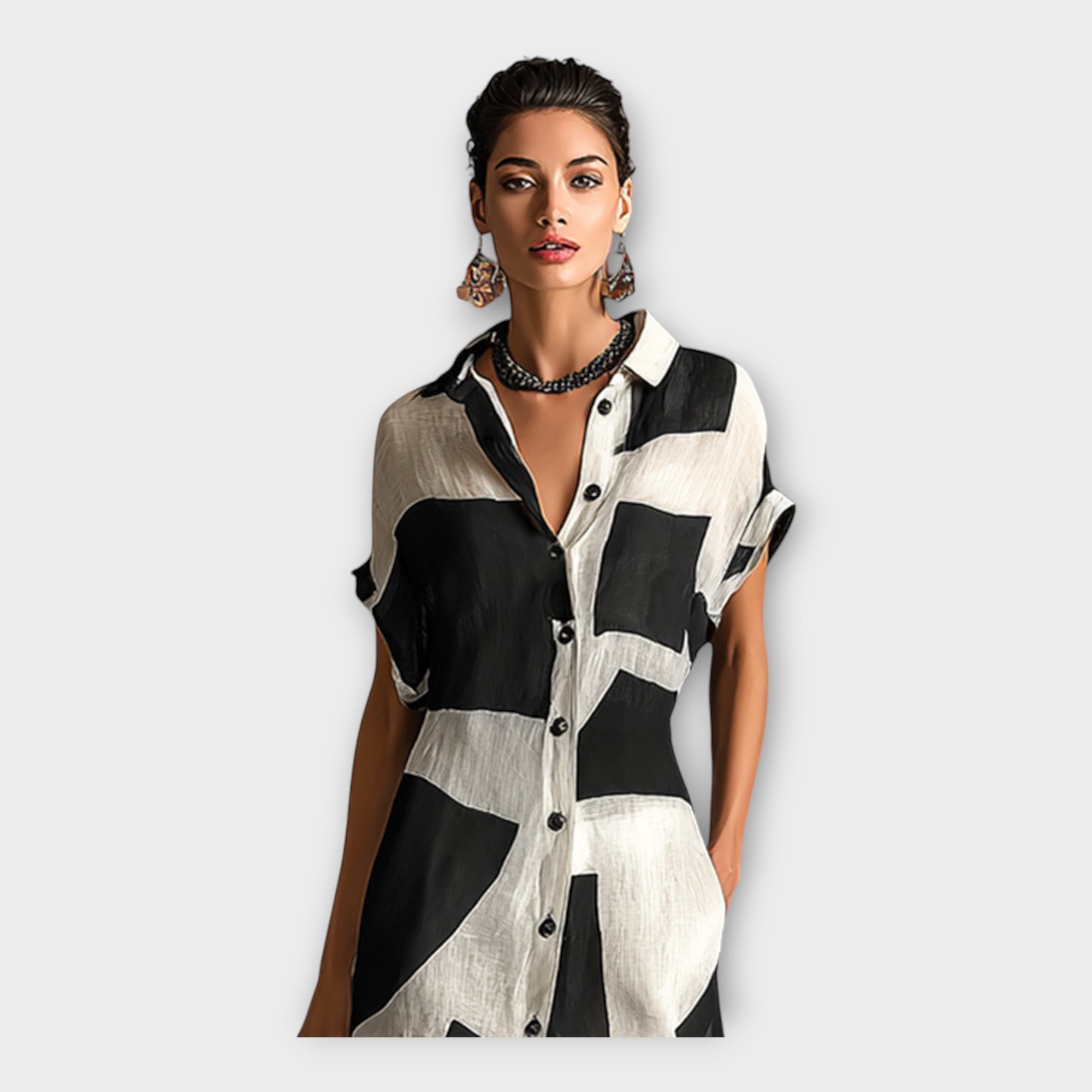 Eleganten dolgi plašč z modernim dizajnom in brezčasno eleganco