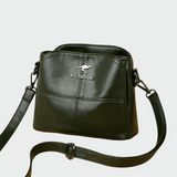 Eleganten usnjen nahrbtnik