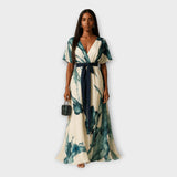 Dolga obleka z pasom in zračnim krojem