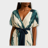 Dolga obleka z pasom in zračnim krojem