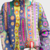 Pleteni pulover z vzorcem sonca